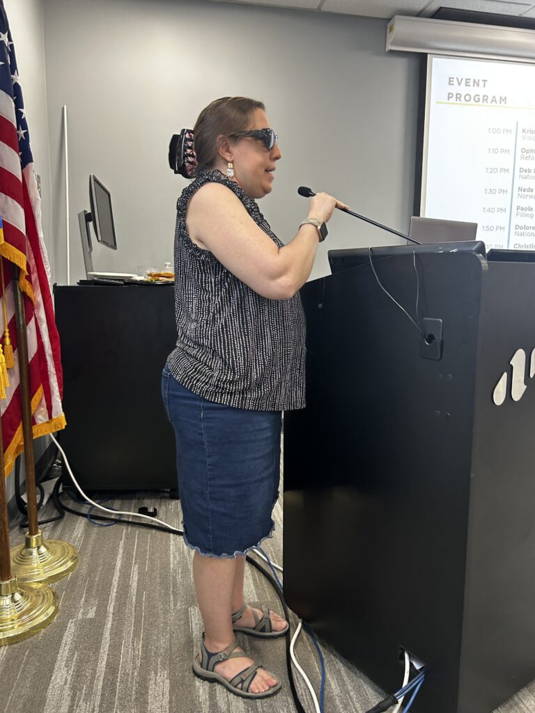 Delores speaker during the event. A National Federation of the Blind member.